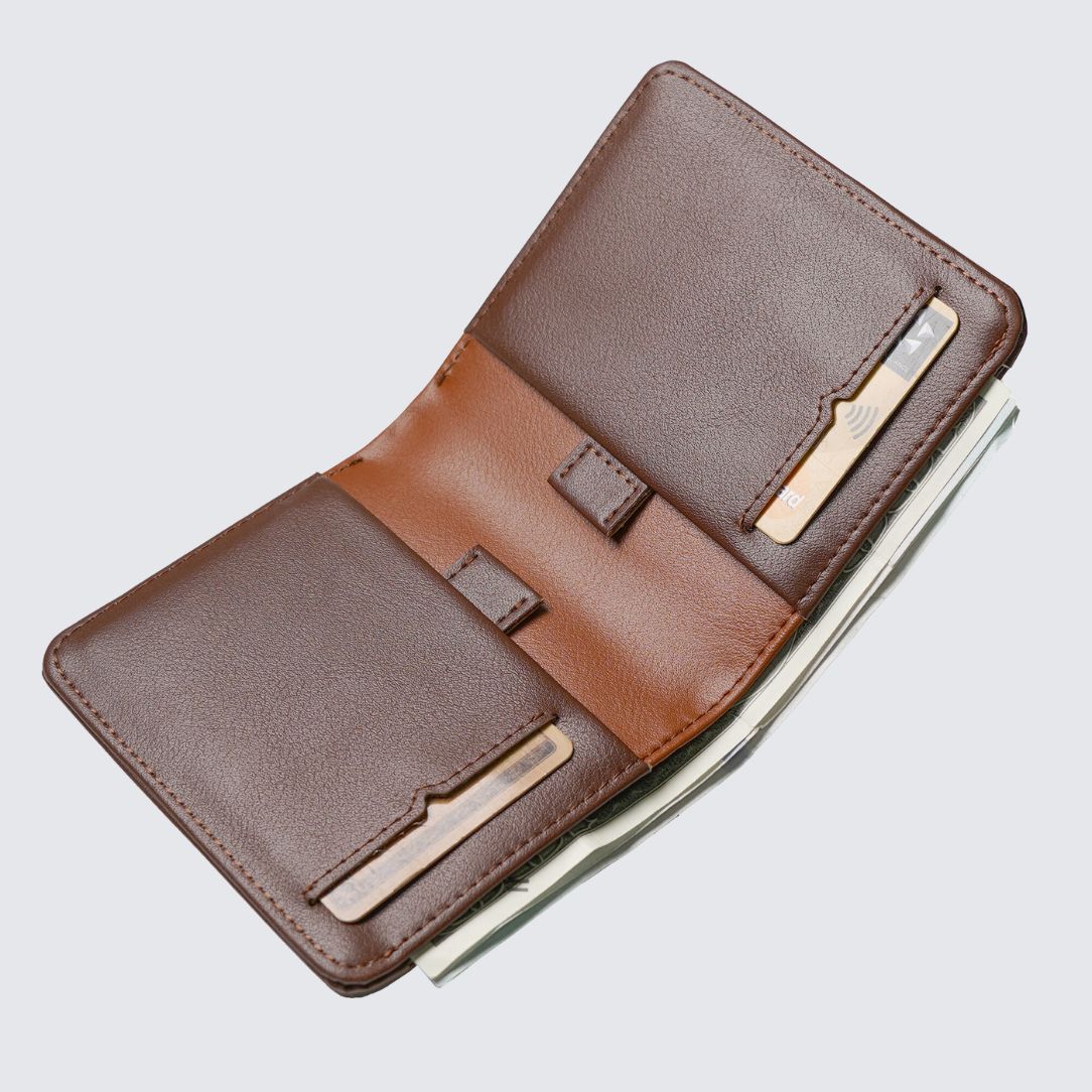 Brown color FREO Wallet two pull tabs for storing up to 8 additional cards