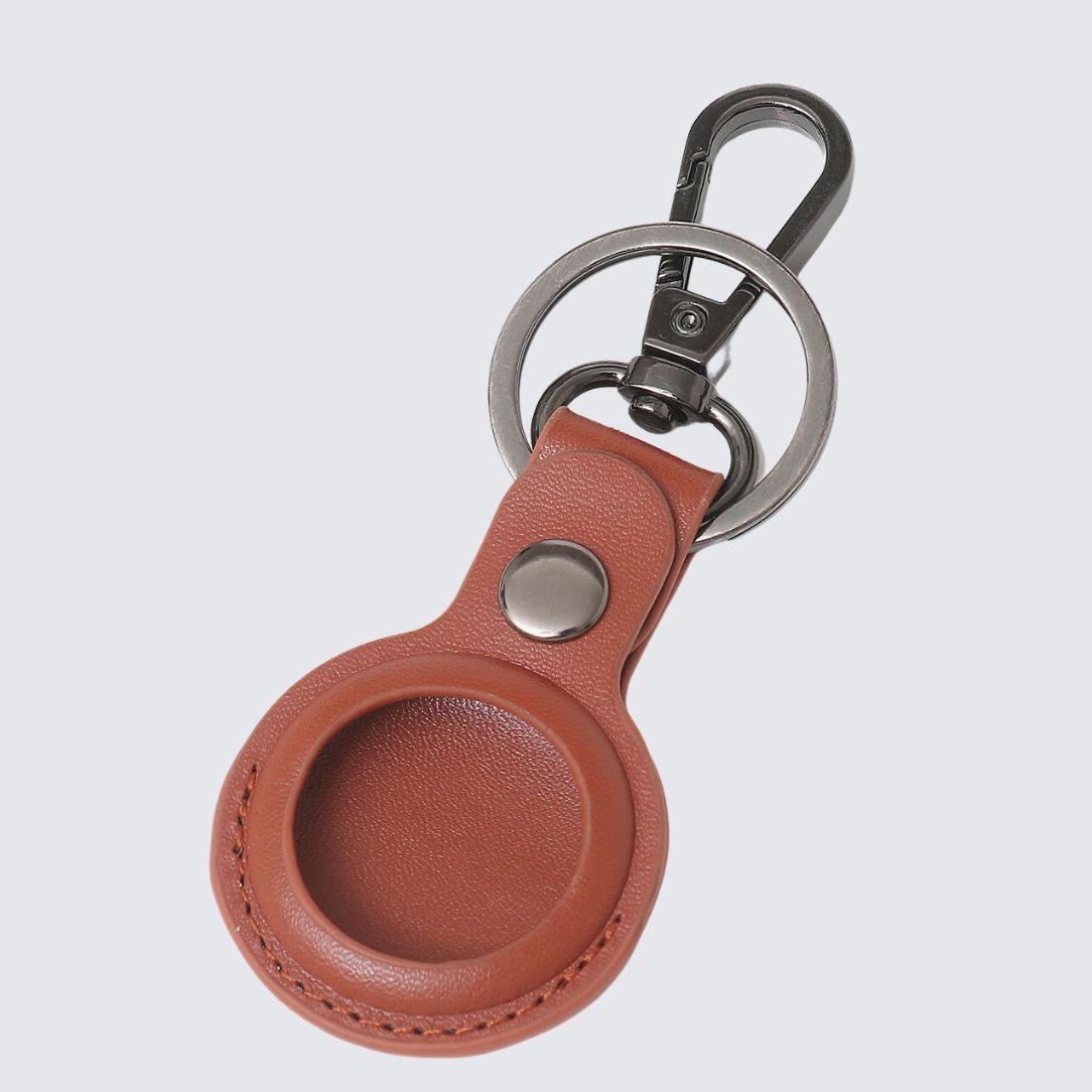 Back side of tan color TILBA Airtag Keyring